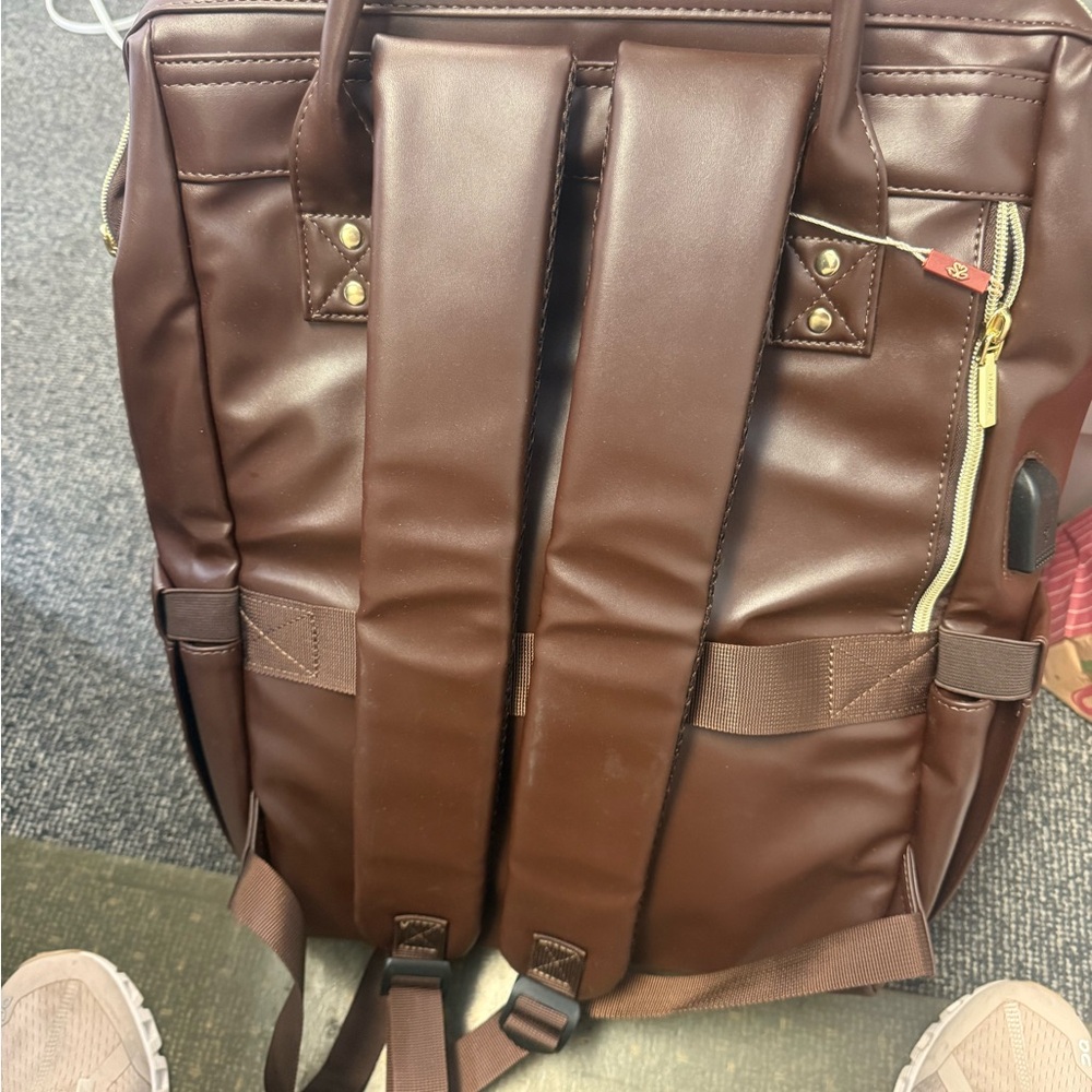 Brown Leather Backpack With Durable Construction - image 3